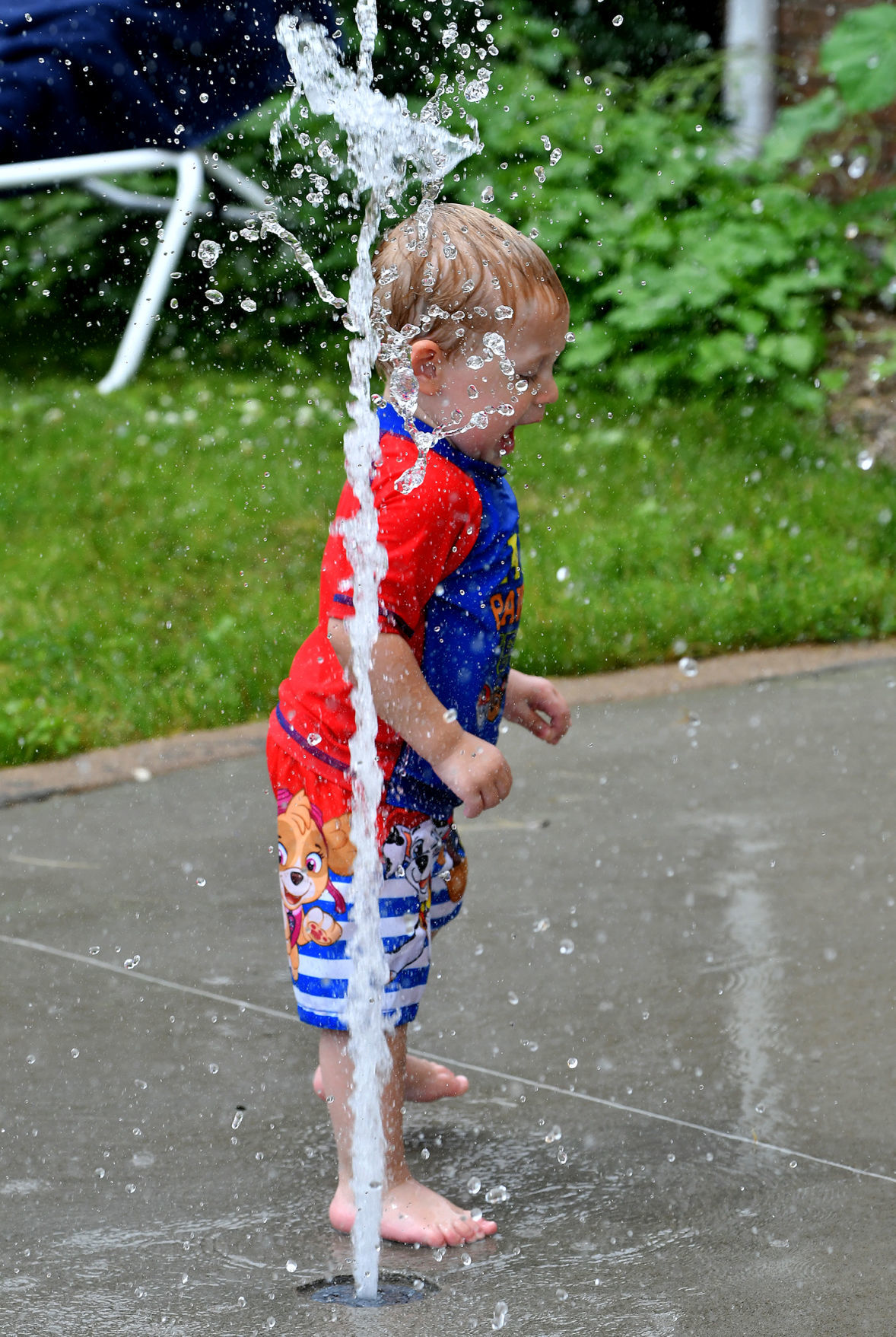 People cooling off on a hot day at Splash Landing in Bettendorf.